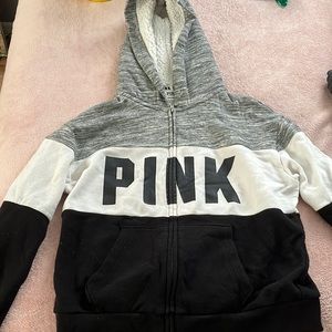 I’m selling a black, gray and white PINK hoodie